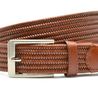 Cognac leren gevlochten stretch riem met zilverkleurige gesp.