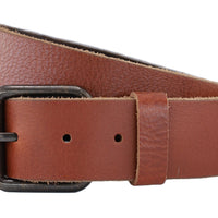 Rouwe cognac buffel soepel leren riem. 4mm dik en afgewerkt met zwart/bronze rolgesp