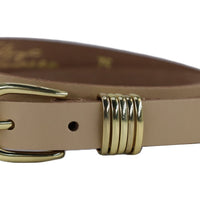 Smalle ecru riem met gouden gesp en lussen. 2cm breed en gemaakt van echt leer.