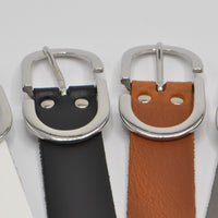 Damesriem met speelse zilverkleurige gesp. 
