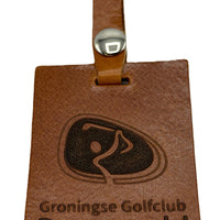 Kofferlabel cognac leer.