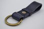 Blauwe vintage sleutelhanger met naam of logo