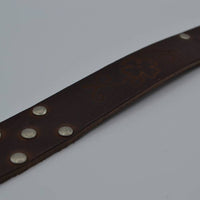 Bruine riem met studs en laserprint 