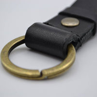 zwarte vintage sleutelhanger met naam of logo