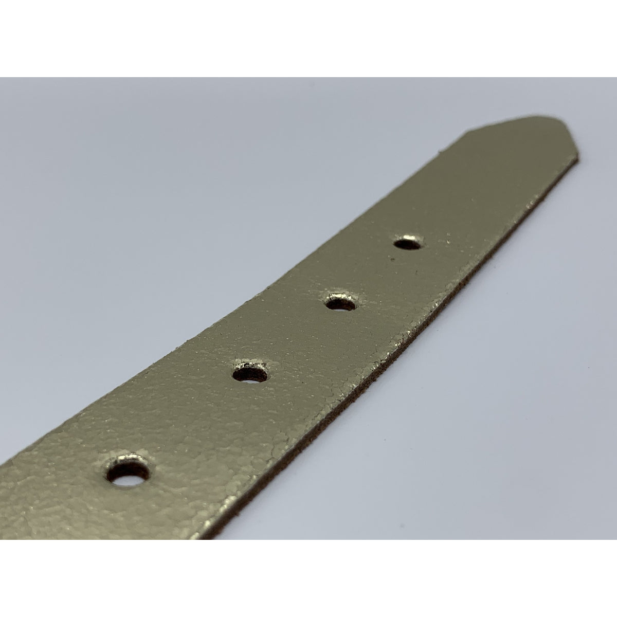 Goud kleurige riem van 3cm breed.