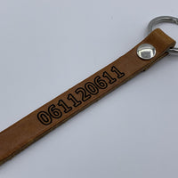 Sleutelhanger met telefoonnummer