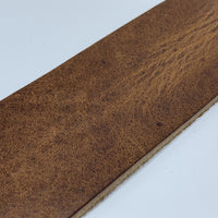 Zandkleurige 5cm brede riem. 