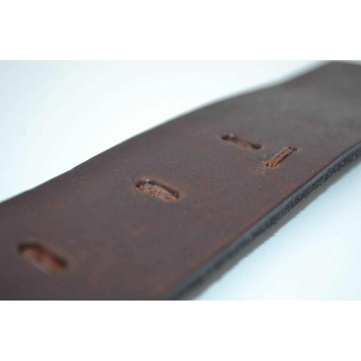 Stoere bruine riem met gave details 