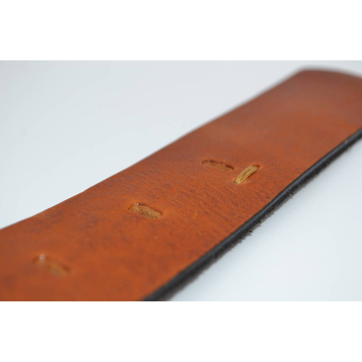 Stoere cognac riem met gave details 
