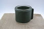 Kaarsenhouder voor theelicht. Glas en donker groen leer