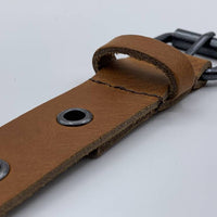 Cognac riem vol met zwarte ringen