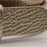 Gouden 3cm brede riem met metallic zwarte gesp.  