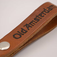Zwarte sleutelhanger met naam of logo