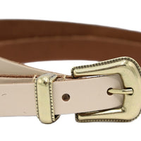 Beige smalle riem met western uitstraling. 