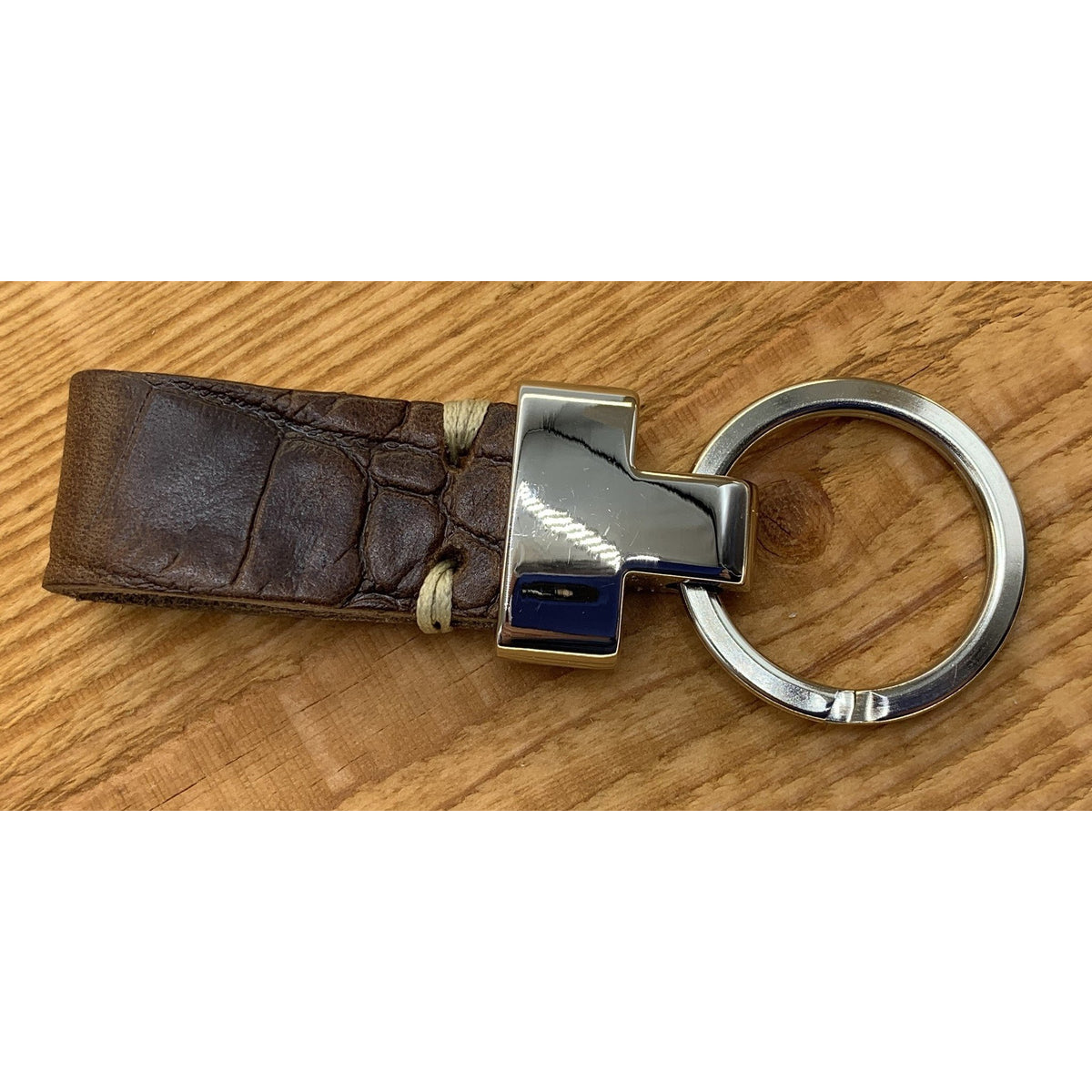 Bruine luxe sleutelhanger met krokodillen print.