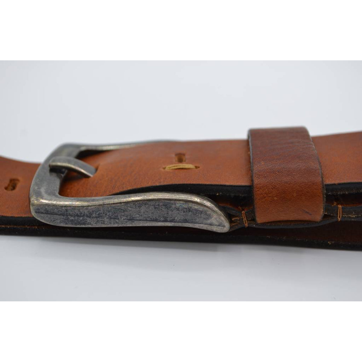 Stoere cognac riem met gave details 