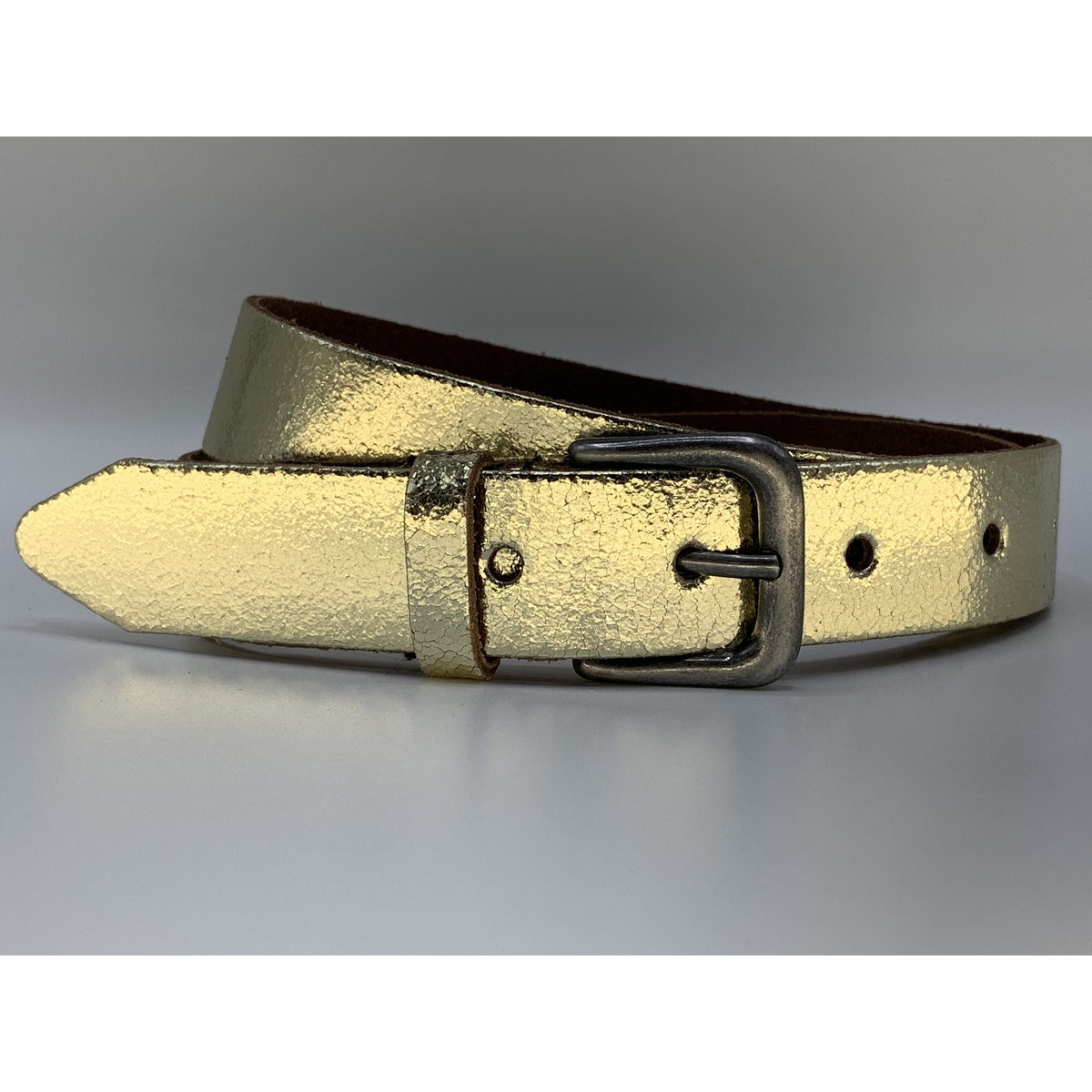 Goud kleurige riem van 3cm breed.