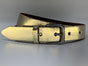 Goud kleurige riem van 3cm breed.