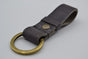 Grijze vintage sleutelhanger met naam of logo