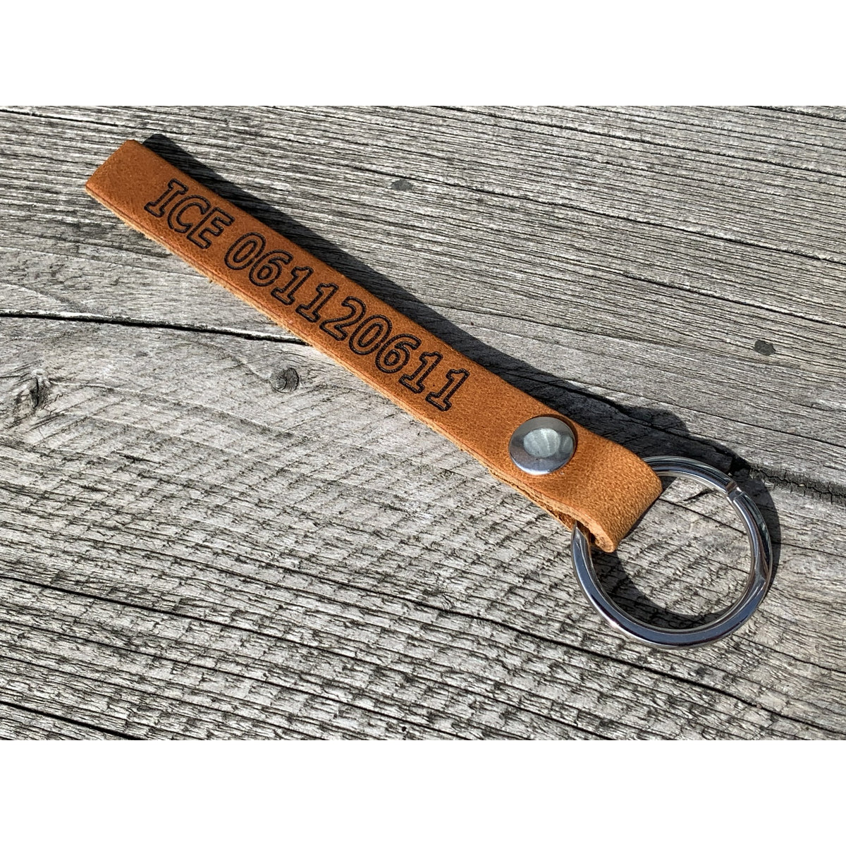 Sleutelhanger met telefoonnummer