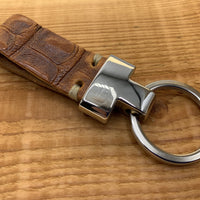 Cognac luxe sleutelhanger met krokodillen print.