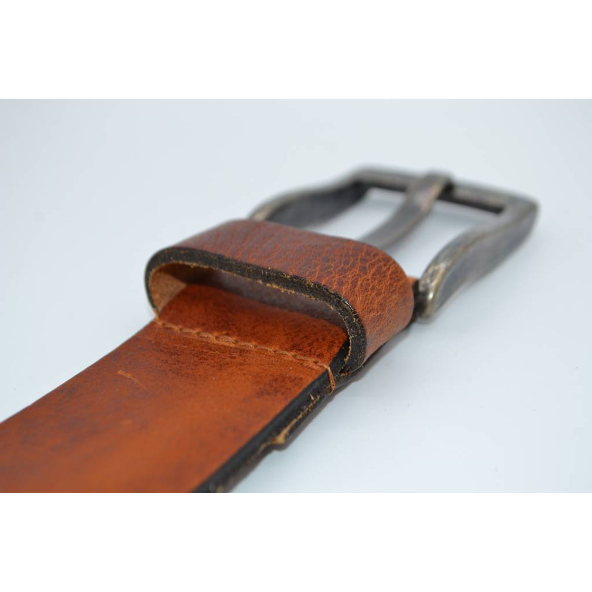 Stoere cognac riem met gave details 