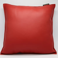 Sierkussen van echt rood leer.
