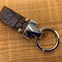 Bruine luxe sleutelhanger met krokodillen print.