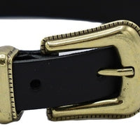 Zwarte smalle riem met western uitstraling. 