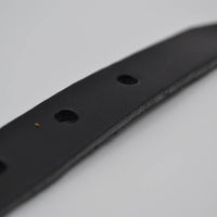 zwarte 20mm brede riem met studs op de lus