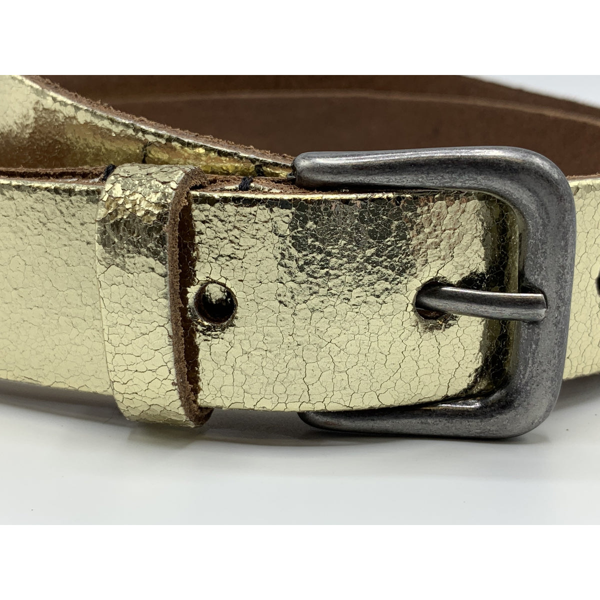 Goud kleurige riem van 3cm breed.
