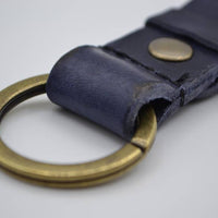 Blauwe vintage sleutelhanger met naam of logo