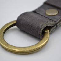 Grijze vintage sleutelhanger met naam of logo 