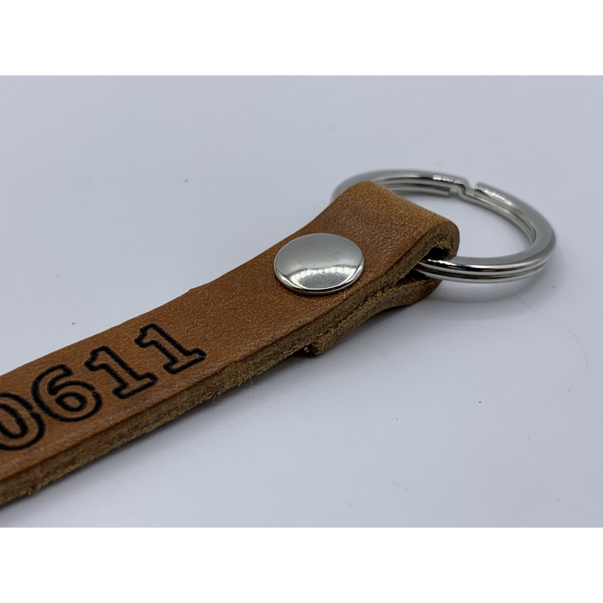 Sleutelhanger met telefoonnummer