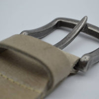 mooie strakke taupe volnerf jeansriem