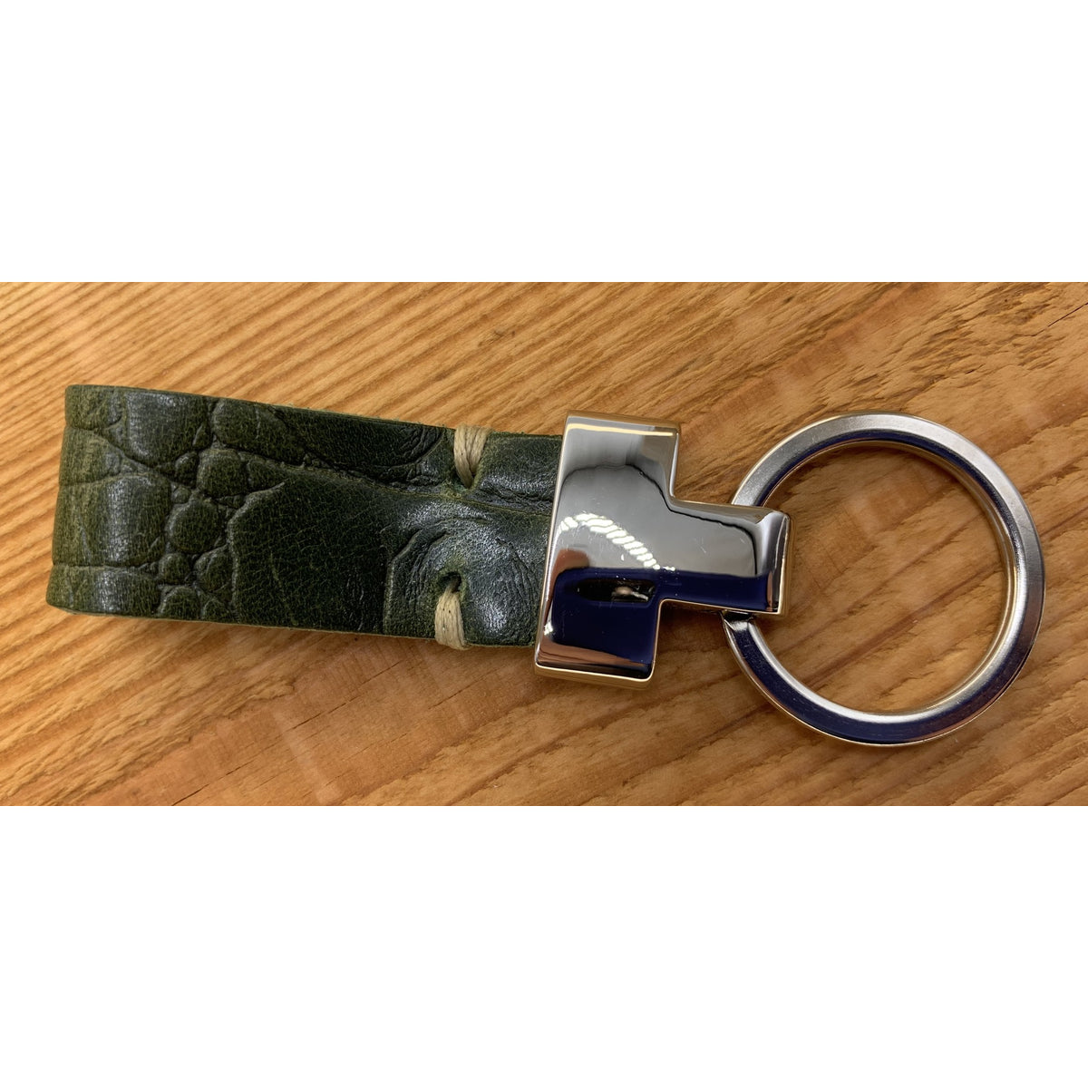 Groene luxe sleutelhanger met krokodillen print.