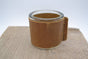 Kaarsenhouder voor theelicht. Glas en grof cognac leer