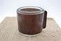Kaarsenhouder voor theelicht. Glas en bruin leer