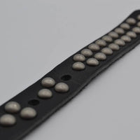zwarte 20mm brede riem met bolstuds
