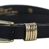 Smalle zwarte riem met gouden gesp en lussen. 2cm breed en gemaakt van echt leer.